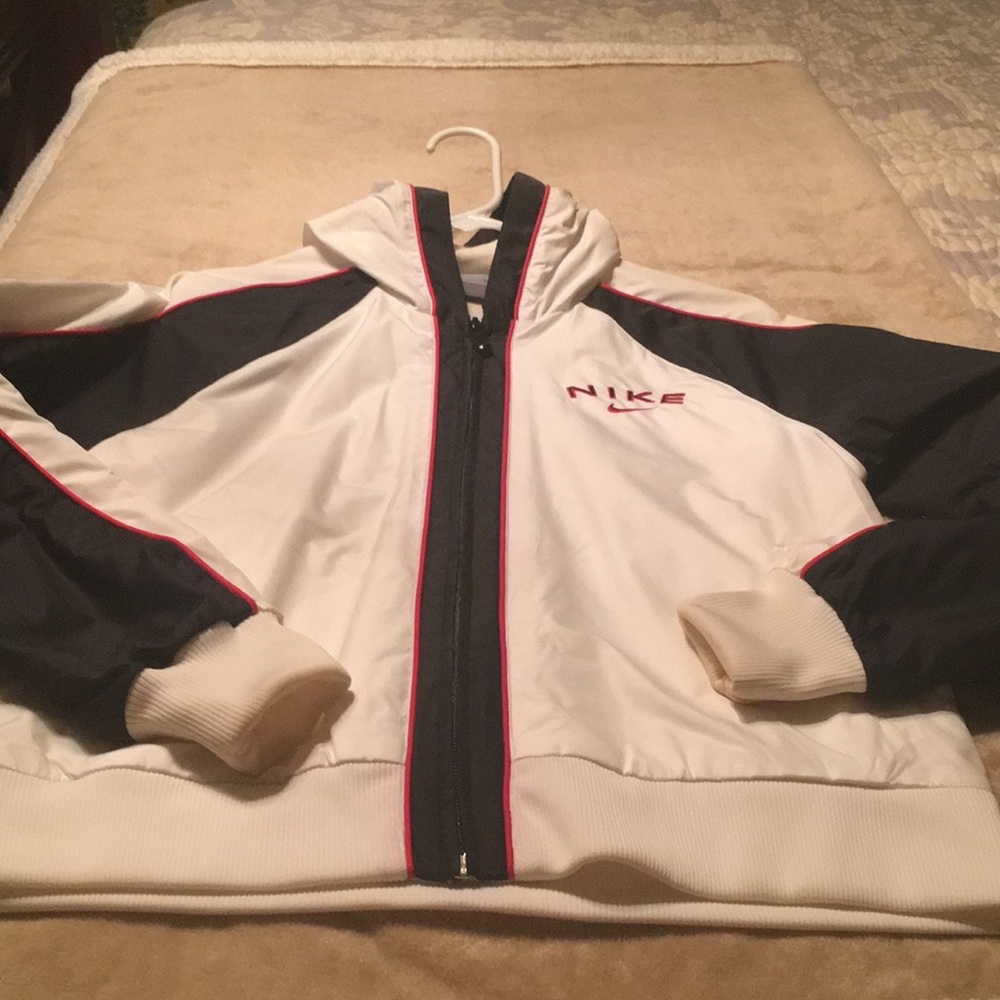 Nike Zip Up Hoodie. Lined and rain resistant.